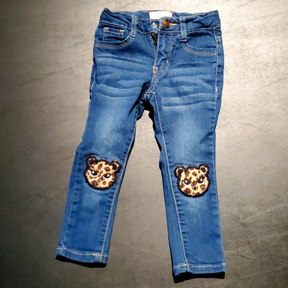 Toddler girl's denim jeans with leopards on knees
